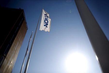 Nokia shares rally as investors respond to strong earnings outlook — Investors gather outside Nokias Helsinki office following upbeat earnings outlook